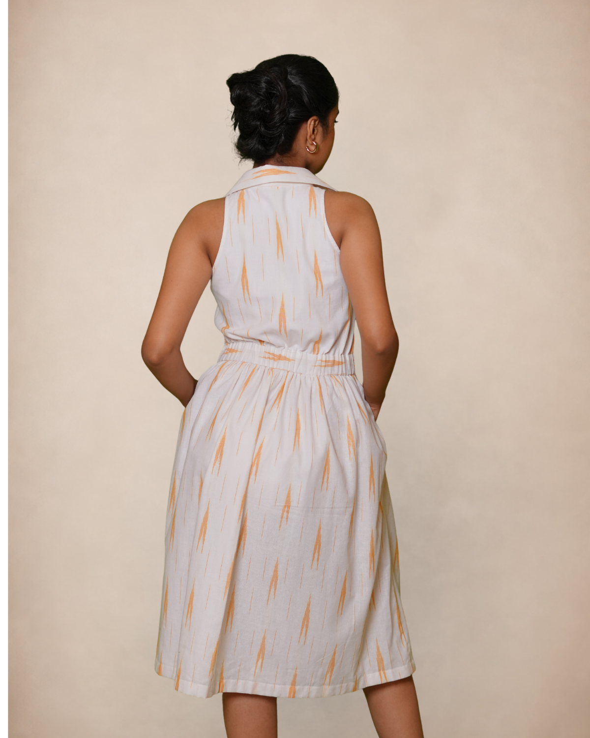 Handloom white & Orange ikat print dress