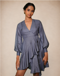a slate blue wrap dress with balloon sleeves and a ruffled skirt