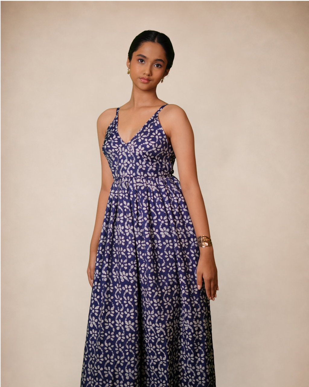 blue maxi dress with a white floral block print pattern