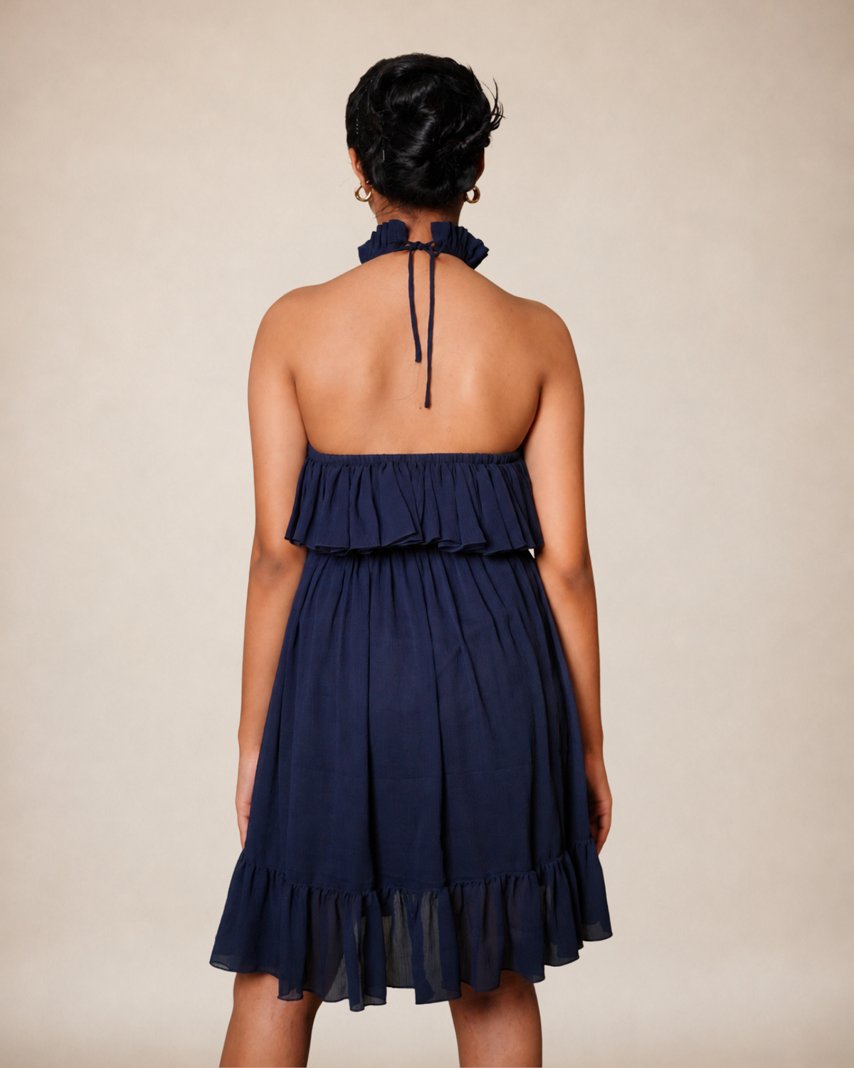Navy blue ruffle halter dress with tiered skirt