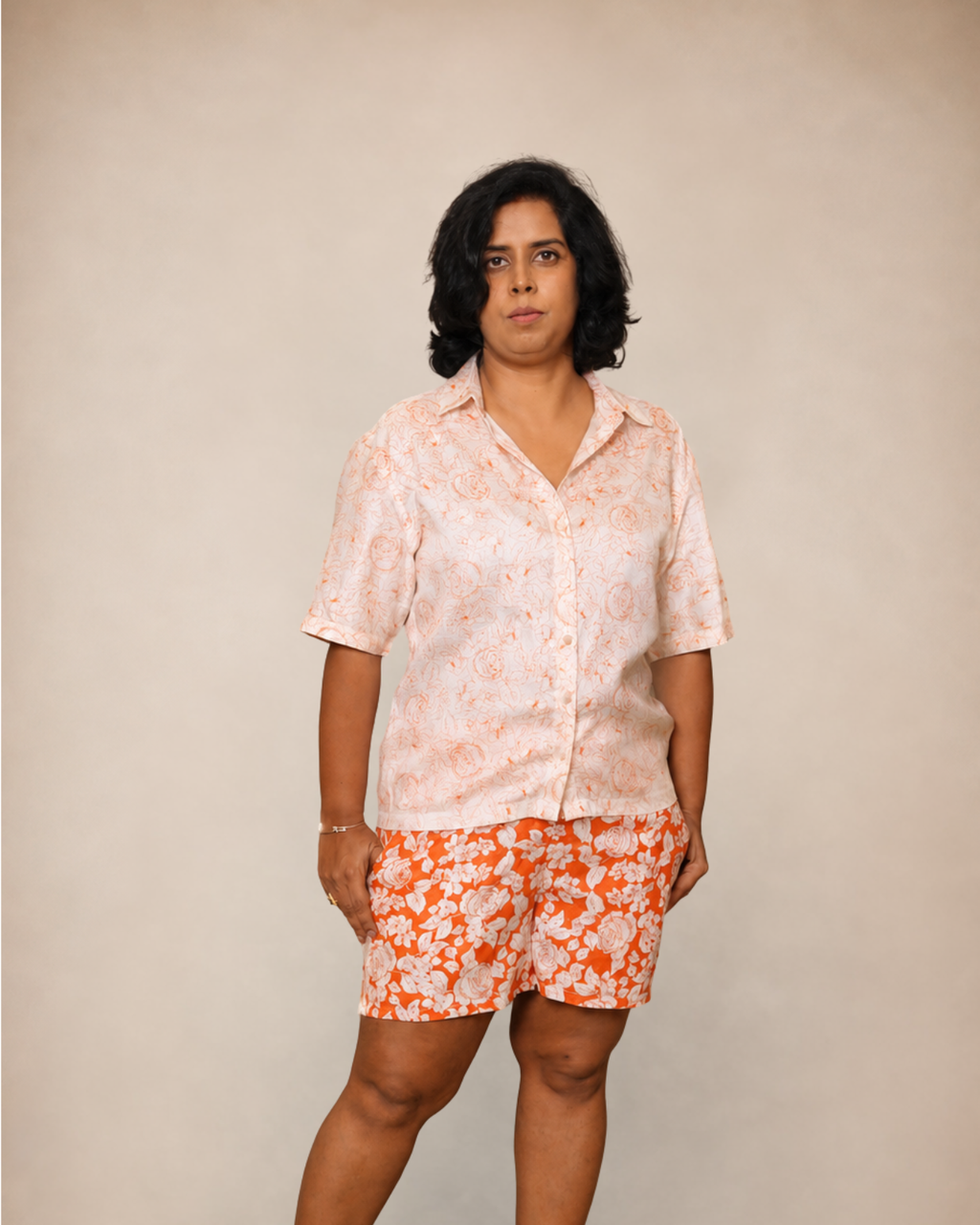 matching two-piece lounge set featuring a short-sleeve button-up shirt and shorts with a floral pattern,H&M,M&S